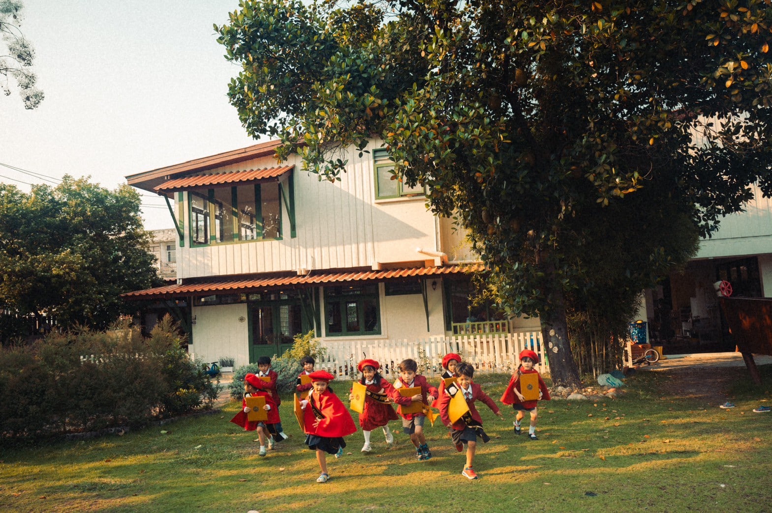 A toddler exploring the Secret Garden at Firefly Forest School’s alternative school in Bangkok.