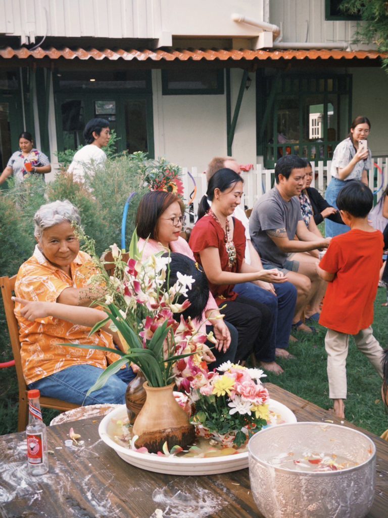 A happy parent and child at Firefly Forest School during a family event in Bangkok.

