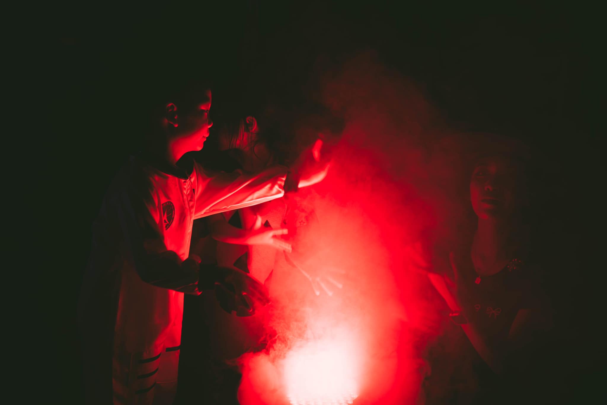 Children exploring a cave during a summer camp at Kaeng Krachan National Park with Firefly Forest School."