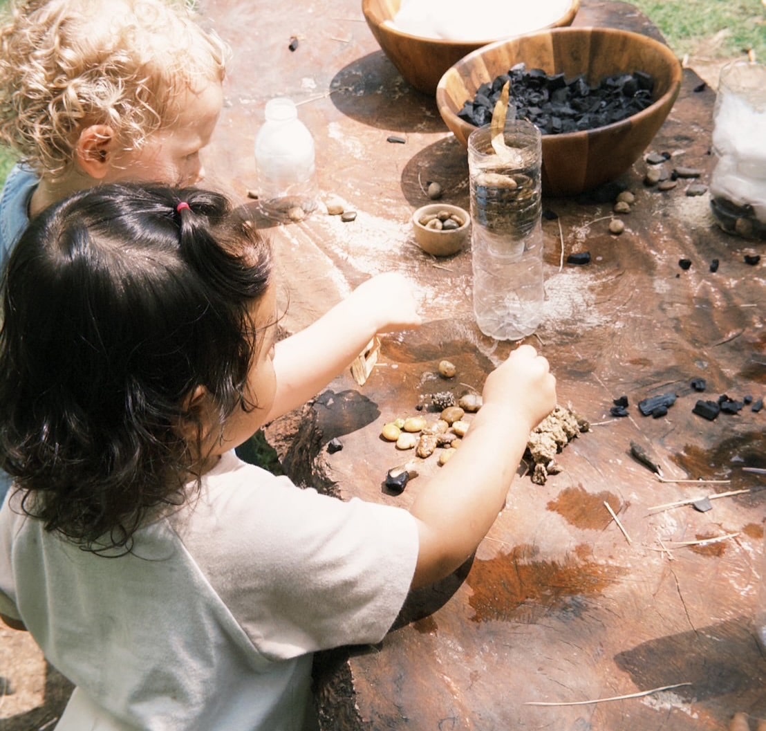 children on a forest adventure during an outdoor summer camp at Firefly Forest School in Bangkok.