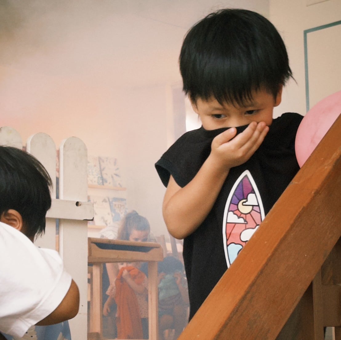 children learning survival skills during a survival skills camp at Firefly Forest School in Bangkok.