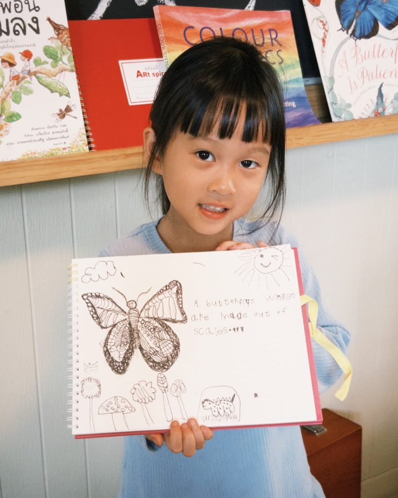 Children singing in English and Thai during a playgroup at Firefly Forest School’s alternative school in Thailand.